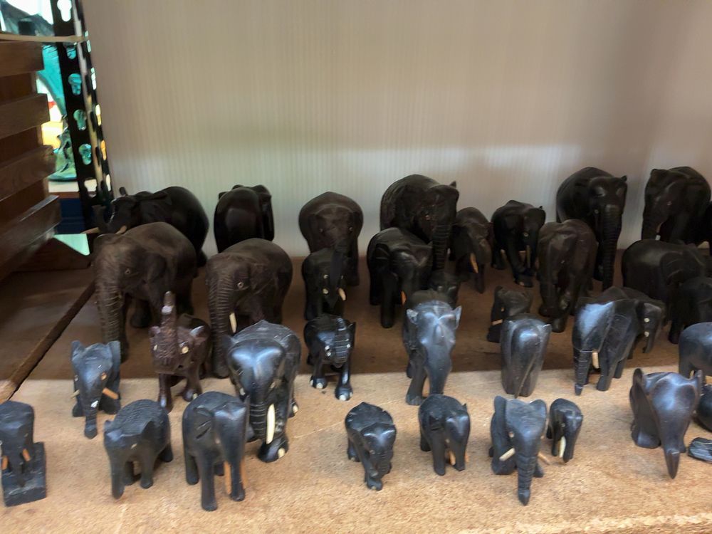 Lot 174: A Collection of Carved Dark Wood Elephant Figurines