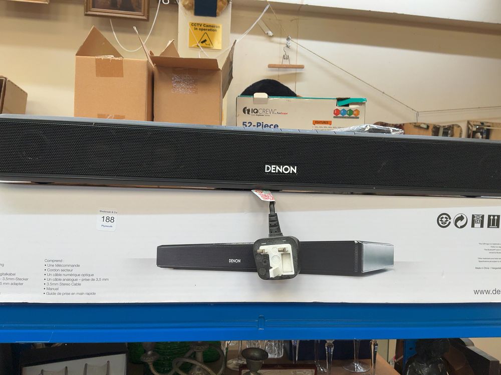 Lot 188: A Denon DHT-T100 TV Speaker Base with Original Packaging