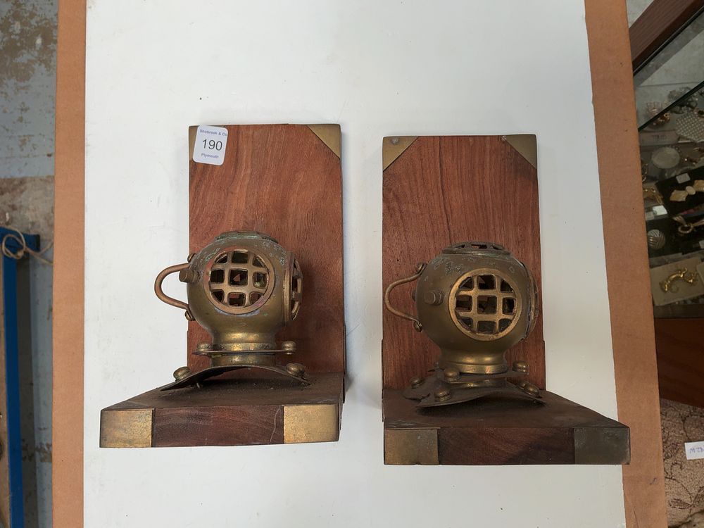 Lot 190: A Pair of Nautical Style Brass Divers Helmet Bookends on Wooden Bases