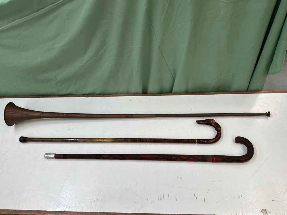 Lot 196: A Trio of Vintage Items Comprising Two Walking Canes and a Copper Alloy Post Horn
