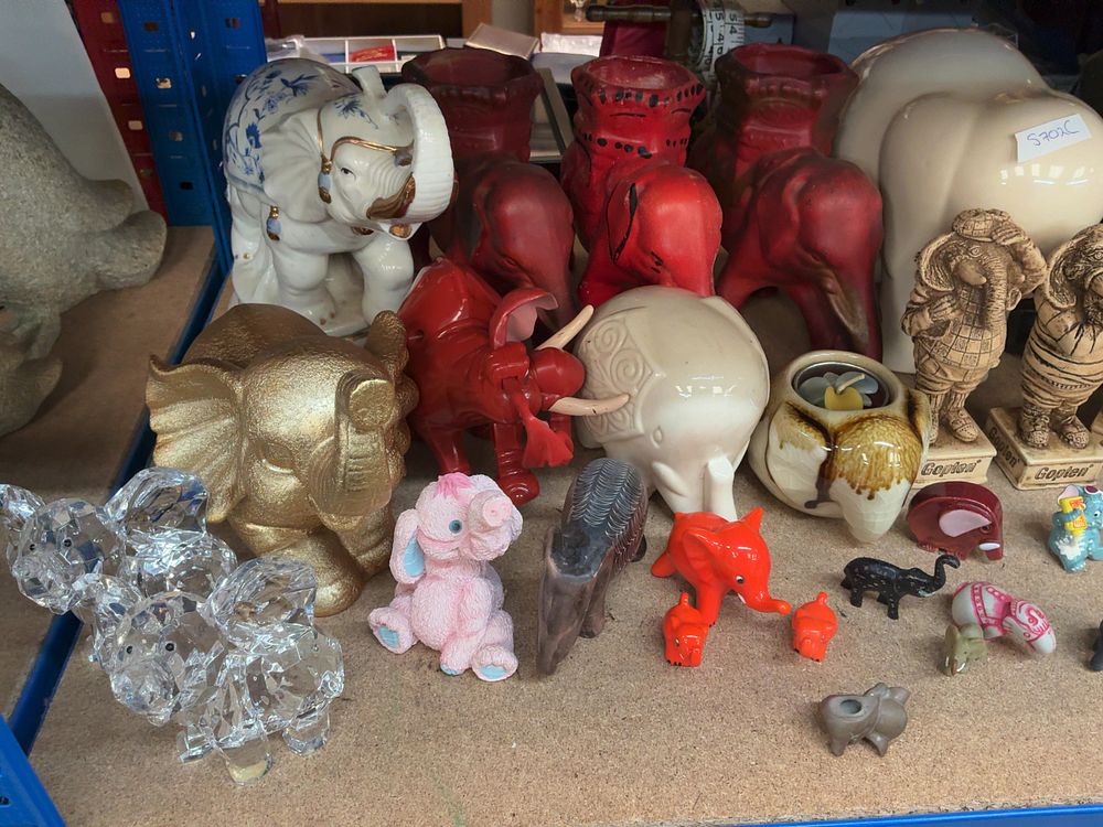 Lot 209: A Collection of Elephant Figurines in Various Styles and Materials Including Gopten Examples