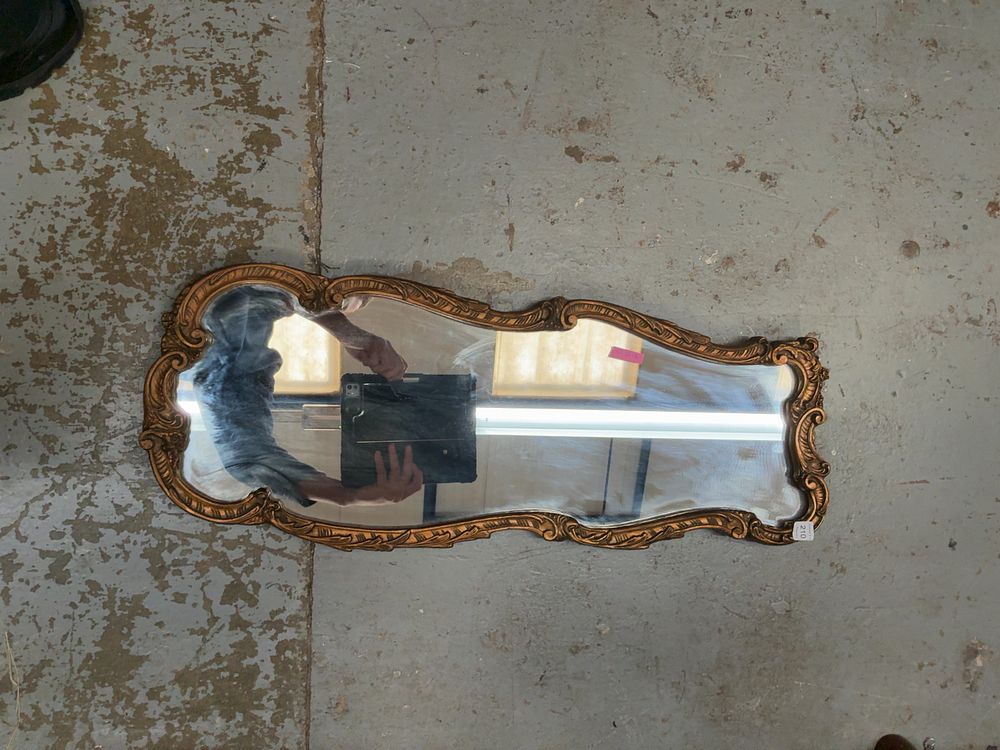 Lot 210: A Rococo Style Gilded Composite Wall Mirror