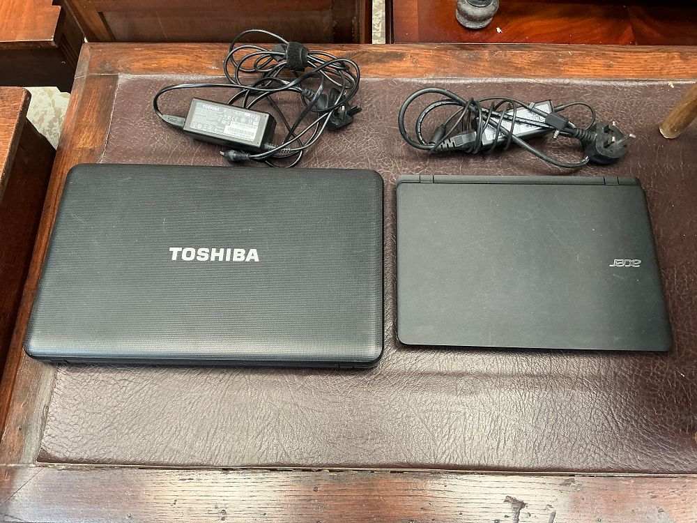 Lot 231: Two Laptops Including Toshiba and Acer Examples with AC Power Adapters