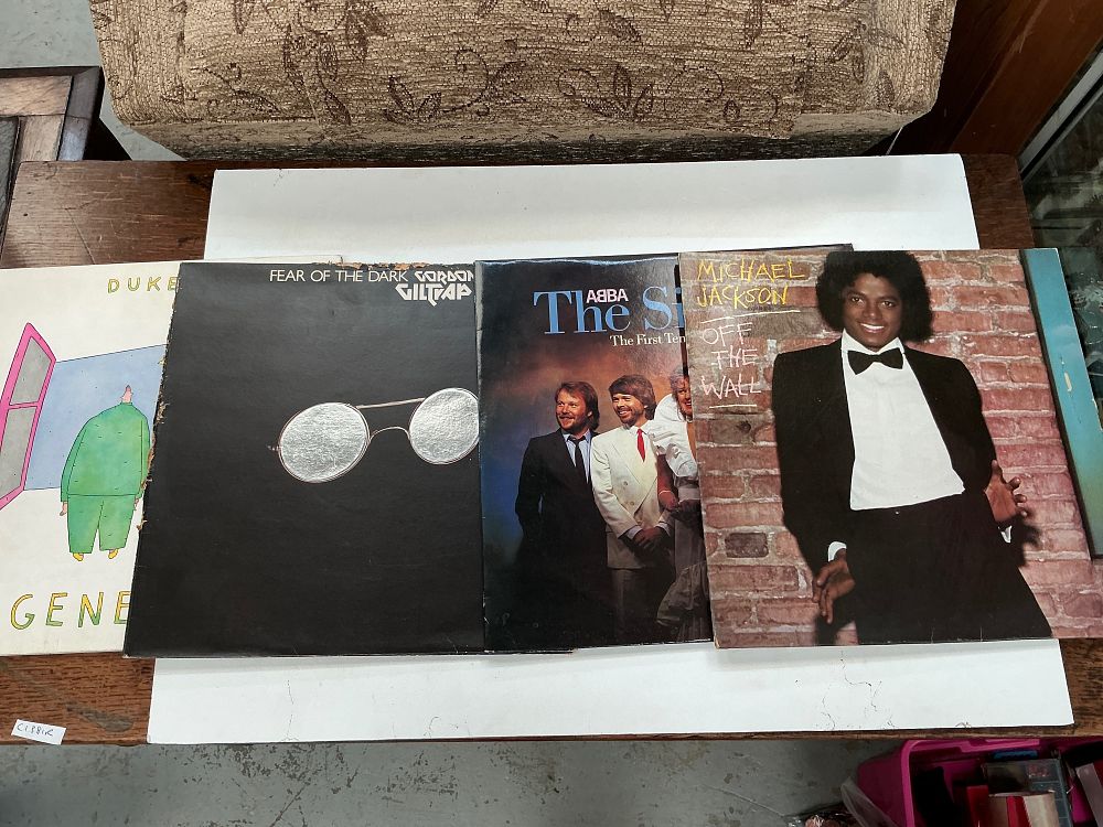 Lot 242: A Collection of Approximately Twenty Five Vinyl LP Records Including Michael Jackson and The Beatles