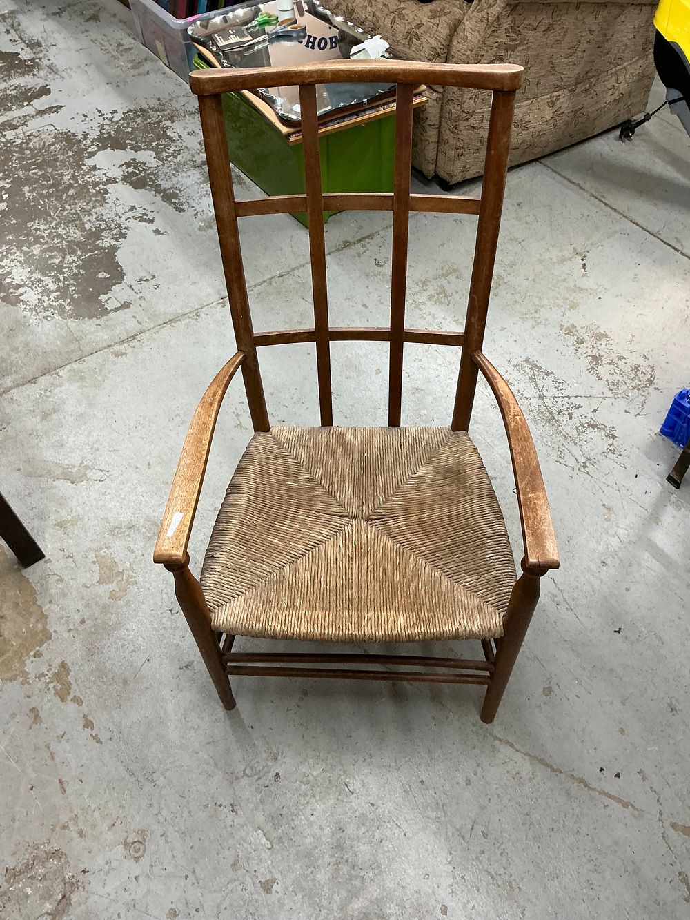 Lot 286: A Mid Century Modern Style Wooden Armchair with Rush Seat