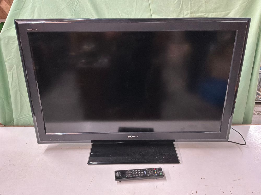 Lot 297: A Sony Bravia KDL-37S5500 37 Inch LCD Television with Remote Control