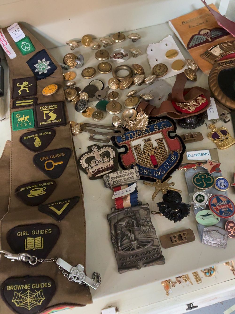 Lot 318: A Collection of Military and Girl Guide Memorabilia Including Fusiliers and Brownie Examples