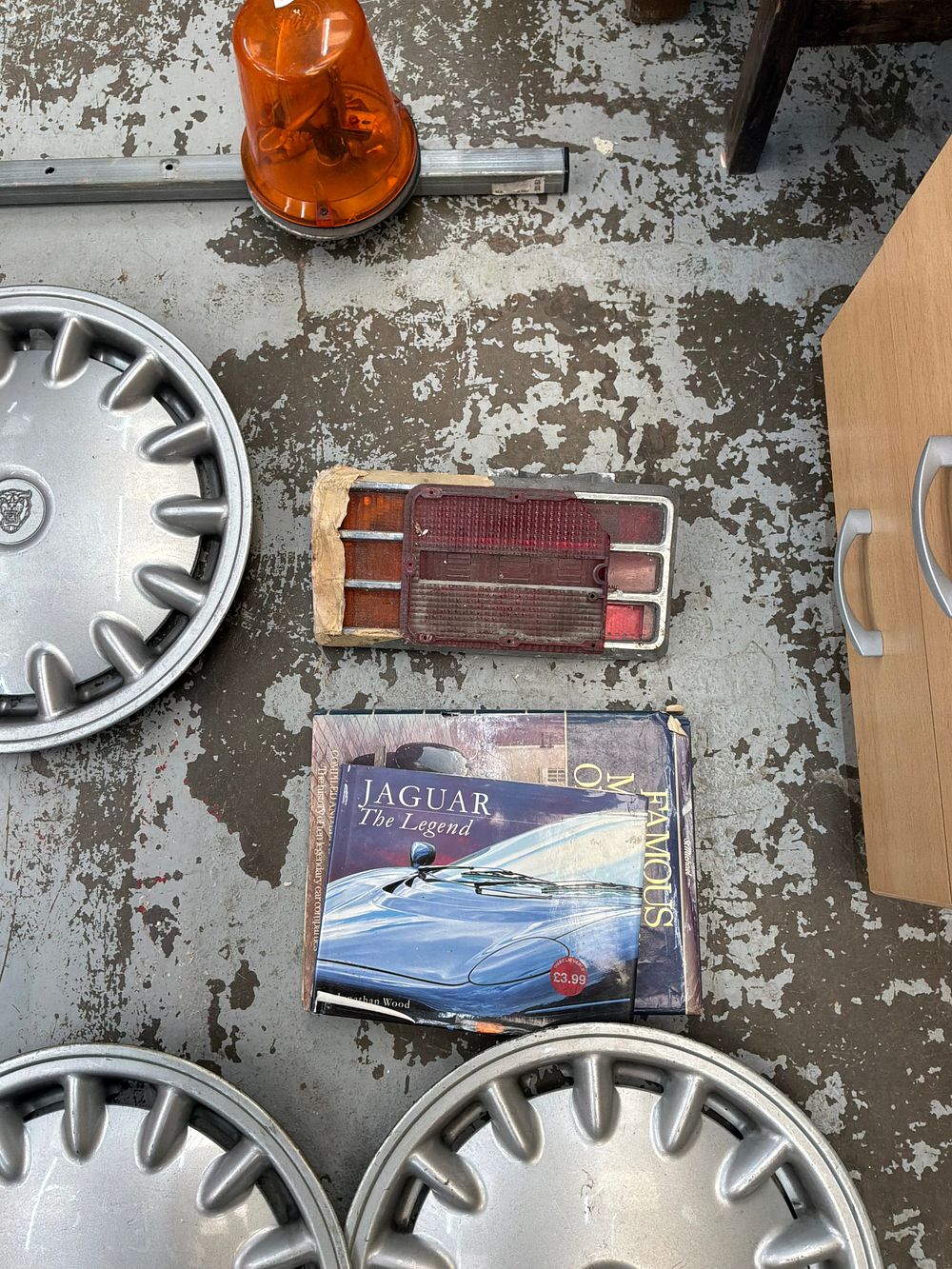 Lot 323: A Collection of Jaguar style Plastic Wheel Trims with a Peugeot Wheel Cover and Automotive Accessories