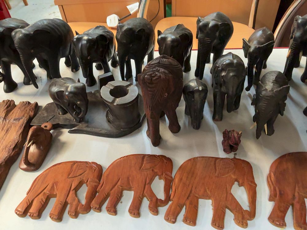 Lot 324: A Collection of Carved Wooden Elephant Figurines and Decorative Items Including a Chambéry Plaque