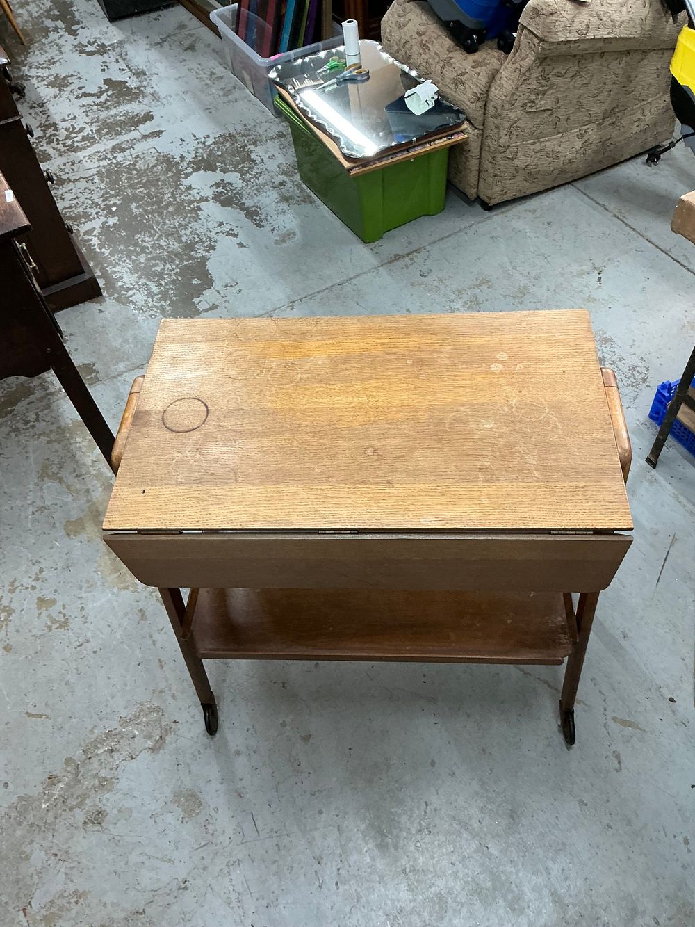 Lot 328: A Mid-Century Modern Oak Veneer Folding Tea Trolley by Remploy