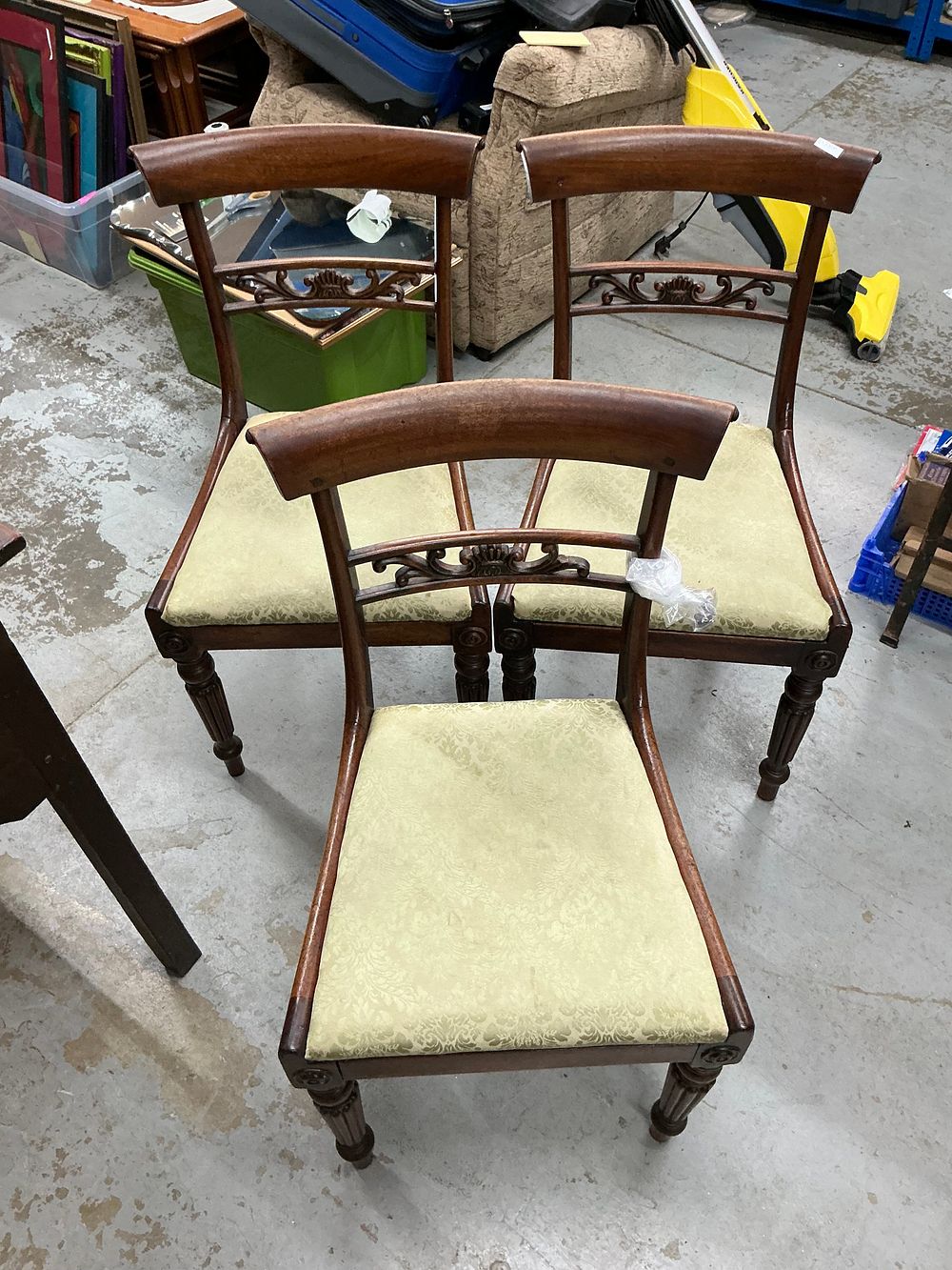 Lot 333: A Mixed Group of Four Regency and George III Style Mahogany Dining Chairs