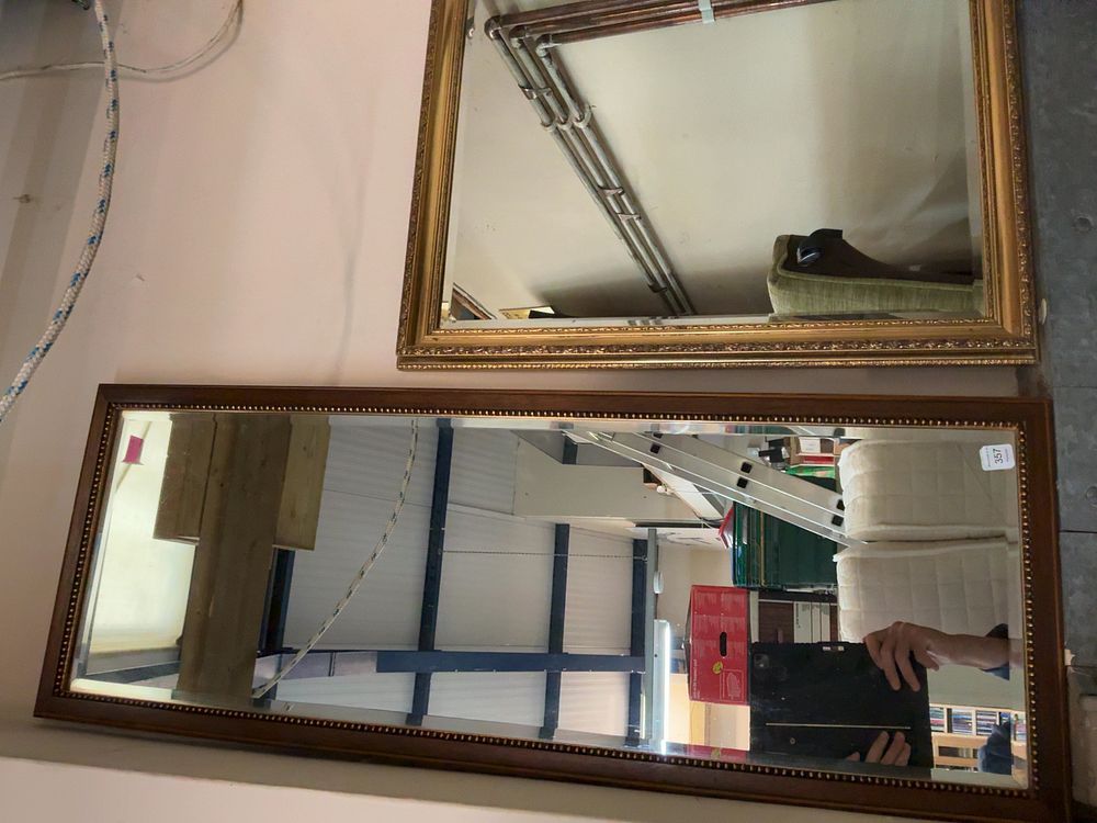 Lot 357: A Pair of Gilt and Wood Finish Wall Mirrors