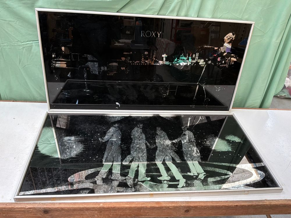 Lot 217: A Pair of Aspell Saggers & Co Ltd 1970s Roxy Music and Beatles Themed Mirrored Art Panels