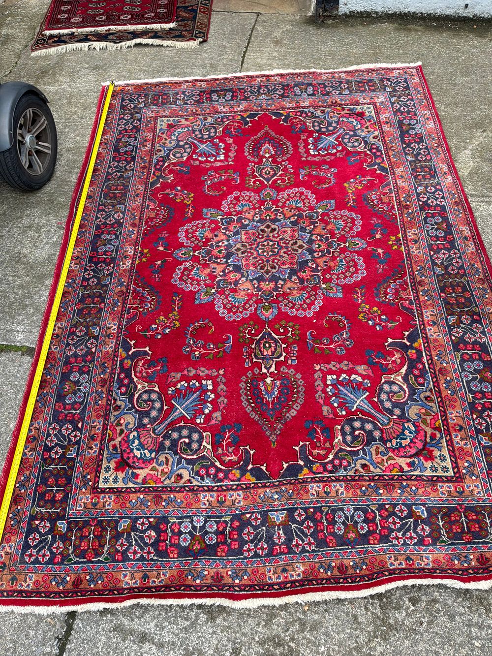 Lot 370: A Hand Knotted Persian Style Wool Rug Featuring A Central Medallion And Floral Field