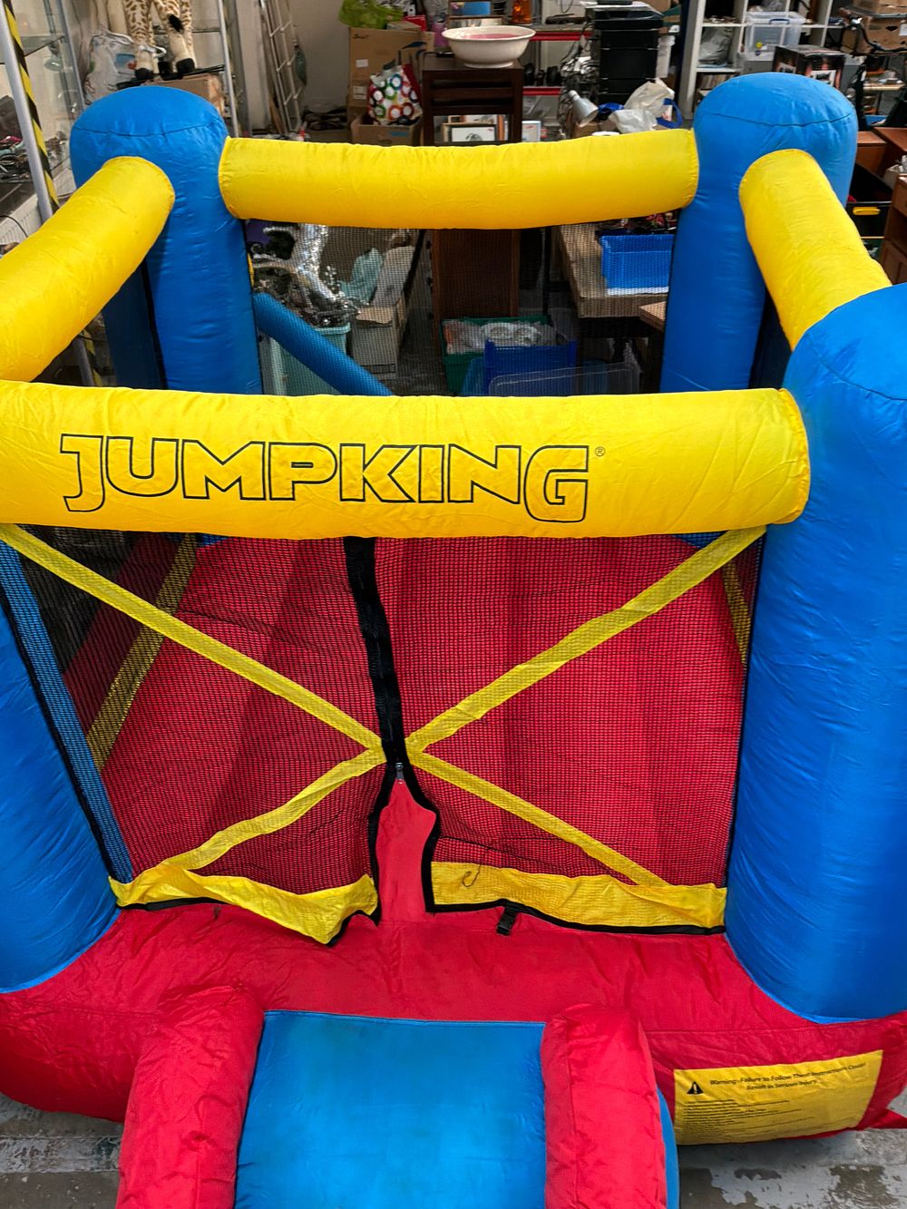 Lot 376: A Jumpking Inflatable Bounce House with Electric Blower Unit