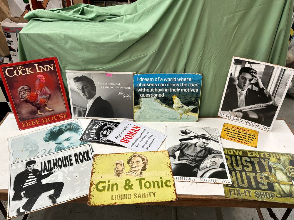 Lot 402: A Collection of Eleven Printed Metal Advertising and Novelty Signs Including Elvis Presley Examples