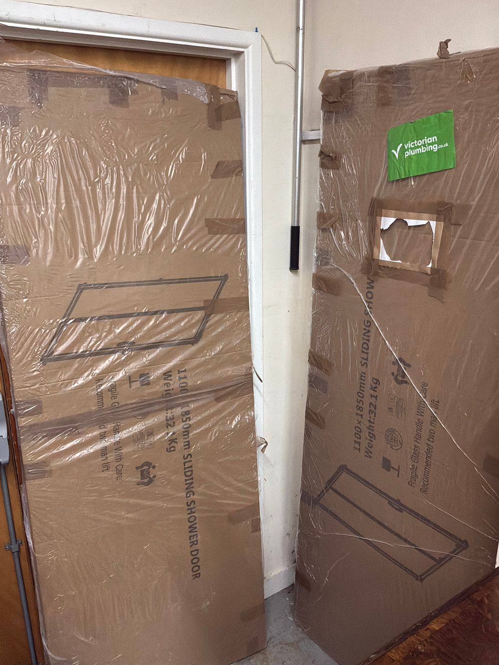 Lot 407: A Pair of Sliding Shower Doors Including a Victorian Plumbing Example