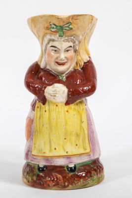 טובי ג'אג ענק בדמות אשה . 'קנקן טובי' Toby Jug 
אנגלי עתיק, מהמאה ה-19 
בדמות אשה אוחזת ספל 
לא 