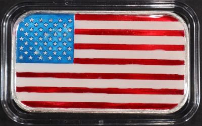ONE OZ .999 ENAMELED AMERICAN FLAG SILVER BAR. LEADERS IN ON-LINE AUCTIONS ESTIMATE $80 - $120.