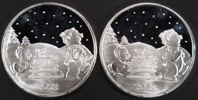 (2) 1 OZ .999 SILVER 2023 XMAS SLED ROUNDS. CHECK OUT OUR UPCOMING AUCTIONS ESTIMATE $100 - $150.