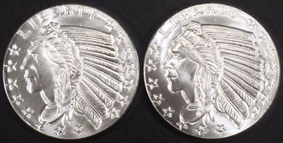 (2) 1 OZ .999 SILVER INDIAN DESIGN ROUNDS. WEEKLY COIN & CURRENCY AUCTIONS ESTIMATE $80 - $120.