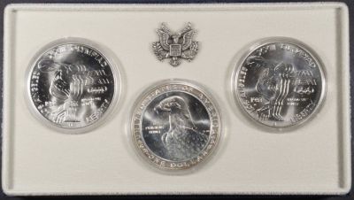 1983-P,D,S OLYMPIC SILVER DOLLAR COMM SET OGP. WEEKLY COIN & CURRENCY AUCTIONS ESTIMATE $90 - $130.