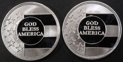 (2) 1 OZ .999 SILVER GOD BLESS AMERICA ROUNDS. CHECK OUT OUR UPCOMING AUCTIONS ESTIMATE $120 - $170.
