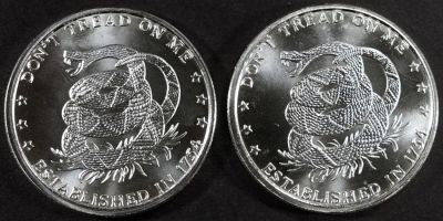 (2) 1 OZ .999 SILVER DON’T TREAD ON ME ROUNDS. CHECK OUT OUR UPCOMING AUCTIONS ESTIMATE $100 - $150.