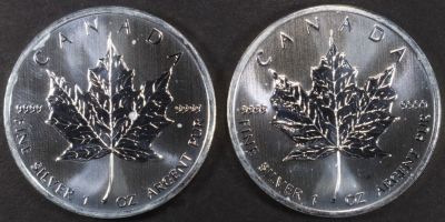 (2) 1 OZ .999 SILVER 2011 CANADIAN MAPLE ROUNDS. CHECK OUT OUR UPCOMING AUCTIONS ESTIMATE $110 - 