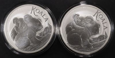 (2) 1 OZ .999 SILVER 2023 AUS KOALA ROUNDS. LEADERS IN ON-LINE AUCTIONS ESTIMATE $100 - $150.