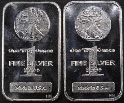 (2) 1 OZ .999 SILVER WALKING LIBERTY BARS. CHECK OUT OUR UPCOMING AUCTIONS ESTIMATE $100 - $150.