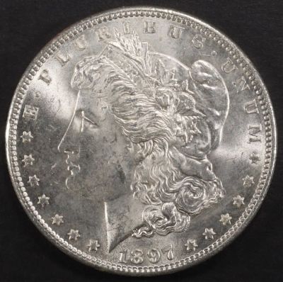 1897 MORGAN DOLLAR CH BU. CHECK OUT OUR UPCOMING AUCTIONS ESTIMATE $100 - $130.