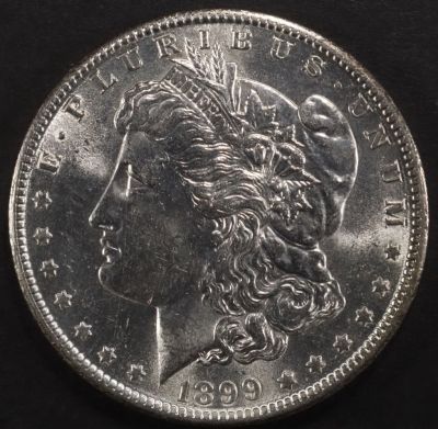 1899-O MORGAN DOLLAR CH BU. TOP RATED AUCTION HOUSE ESTIMATE $100 - $130.