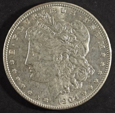1904 MORGAN DOLLAR BU. LEADERS IN ON-LINE AUCTIONS ESTIMATE $150 - $200.