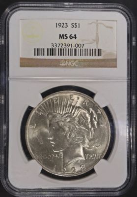 1923 PEACE DOLLAR NGC MS64. CHECK OUT OUR UPCOMING AUCTIONS ESTIMATE $90 - $130.