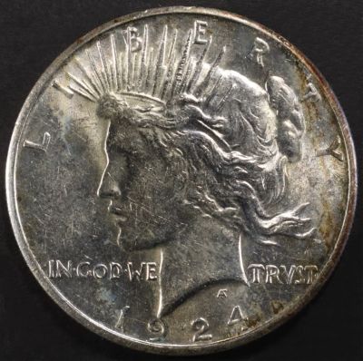 1924-S PEACE DOLLAR BU. LEADERS IN ON-LINE AUCTIONS ESTIMATE $300 - $400.
