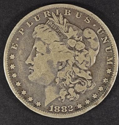 1882-O/S MORGAN DOLLAR FINE. ESTIMATE $60 - $80.