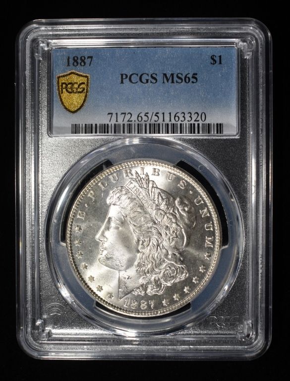 1887 MORGAN DOLLAR PCGS MS 65. TOP RATED AUCTION HOUSE ESTIMATE $200 - $250.