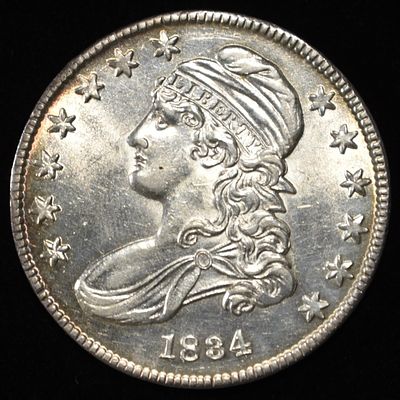 1834 BUST HALF DOLLAR CH BU. WEEKLY COIN & CURRENCY AUCTIONS ESTIMATE $1500 - $1800.