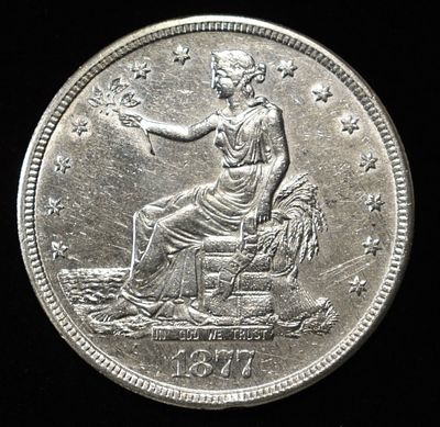1877-S TRADE DOLLAR CH AU. ESTIMATE $600 - $700.