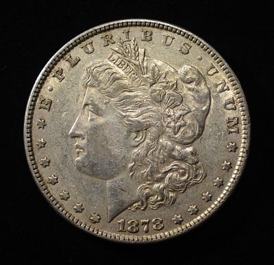 1878 7TF REV. 78 MORGAN DOLLAR XF/AU. WEEKLY COIN & CURRENCY AUCTIONS ESTIMATE $70 - $90.