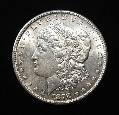 1878-S MORGAN DOLLAR BU. BID WITH SILVER CITY AUCTIONS ESTIMATE $80 - $100.