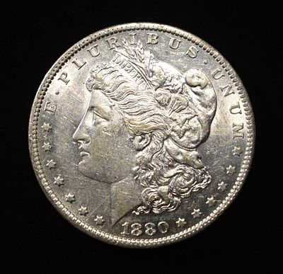 1880-O MORGAN DOLLAR AU/BU. LEADERS IN ON-LINE AUCTIONS ESTIMATE $120 - $150.