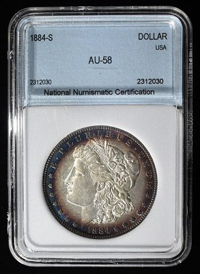 1884-S MORGAN DOLLAR AU/BU. TOP RATED AUCTION HOUSE ESTIMATE $2000 - $2500.