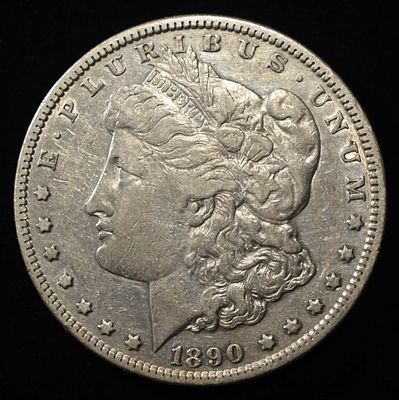 1890-CC MORGAN DOLLAR XF. WEEKLY COIN & CURRENCY AUCTIONS ESTIMATE $300 - $350.