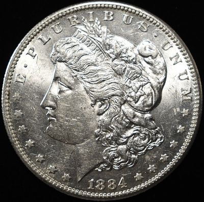 1884-S MORGAN DOLLAR AU/BU. BID WITH SILVER CITY AUCTIONS ESTIMATE $3000 - $3500.