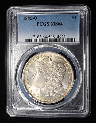 1885-O MORGAN DOLLAR PCGS MS 64. TOP RATED AUCTION HOUSE ESTIMATE $130 - $150.