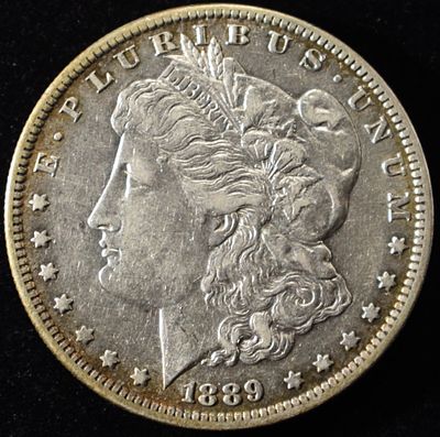 1889-O MORGAN DOLLAR XF. CHECK OUT OUR UPCOMING AUCTIONS ESTIMATE $75 - $100.