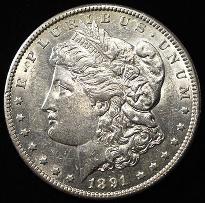 1891-CC MORGAN DOLLAR AU/BU. LEADERS IN ON-LINE AUCTIONS ESTIMATE $600 - $700.
