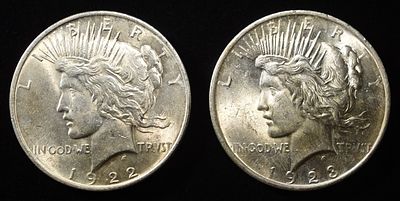 1922, 23 PEACE DOLLARS. LEADERS IN ON-LINE AUCTIONS ESTIMATE $80 - $120.